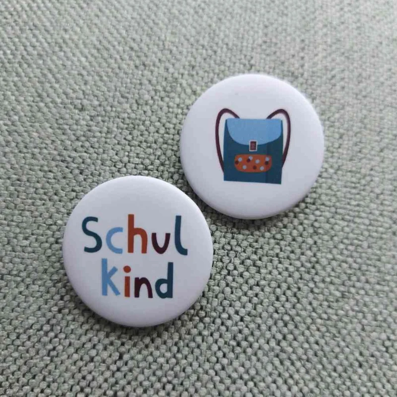 BUTTONS Anstecker 2er Set ADVENTURE KIDS zur EINSCHULUNG Schulkind + Schulranzen | AVA & YVES