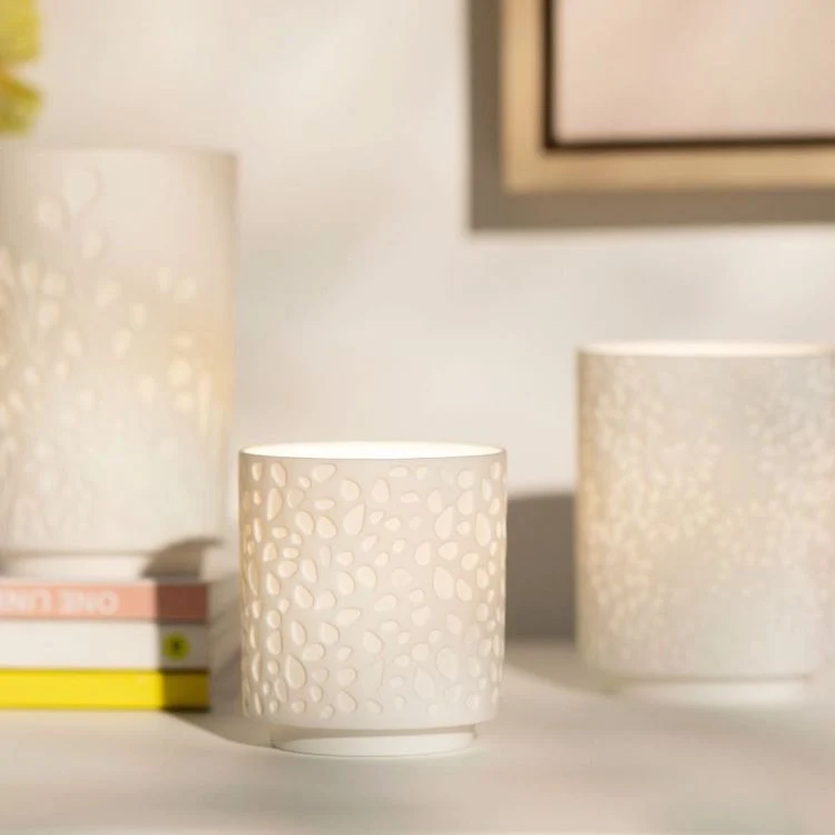 Räder Wunderblätter Vase Zweige