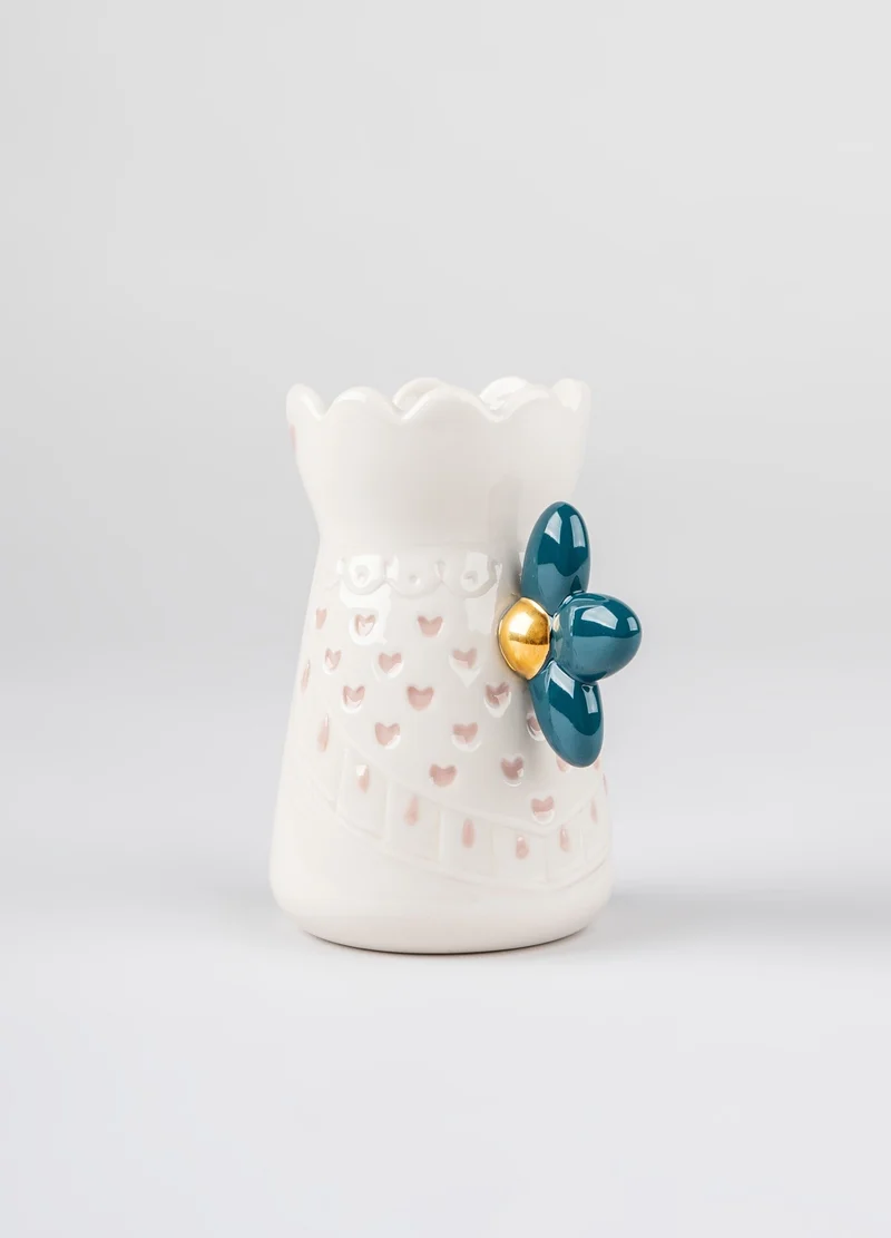Porzellan-Milchkännchen aus der KAWKI Kollektion in Weiß und Rosa