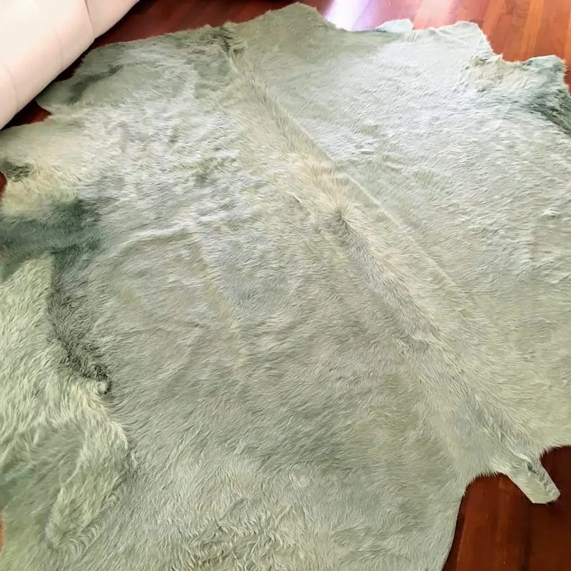 Kuhfell Teppich in Aquagrün