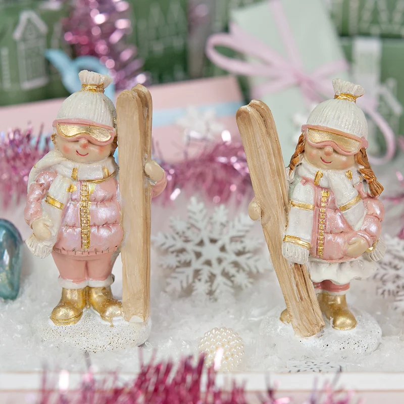Winterfiguren 2er Set – Mädchen mit Ski aus Polyresin, 11 cm in Rosa