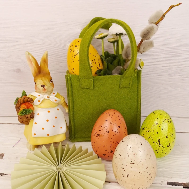 Logbuch-Verlag 2er Set Osterhasen sitzend mit Karotten – Dekofiguren 13 cm aus Polyresin – Frühlingsdeko in Braun Orange Weiß – Osterdeko zum Hinstellen