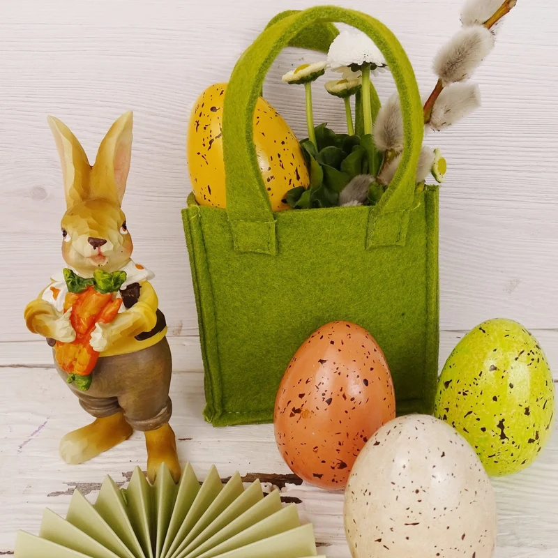 Logbuch-Verlag 2er Set Osterhasen sitzend mit Karotten – Dekofiguren 13 cm aus Polyresin – Frühlingsdeko in Braun Orange Weiß – Osterdeko zum Hinstellen