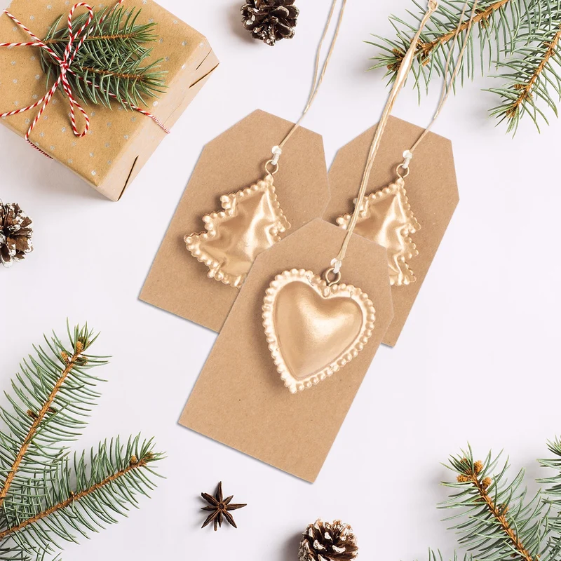 12 Mini Weihnachtsanhänger 5 cm aus Metall goldfarben