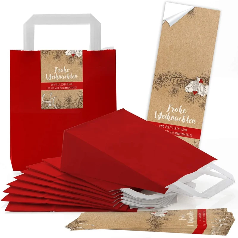 Rote Henkeltüten 18 x 8 x 22 cm mit Weihnachtsbanderole „Frohe Weihnachten“ und Misteln