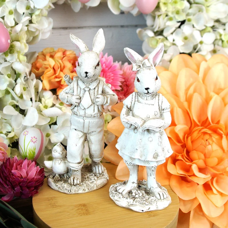 Logbuch-Verlag 2er-Set Hasenfiguren 16 cm aus Polyresin – sortierte Osterdeko in Steinoptik mit Buch & Vogel – Elegante Frühlingsdeko Figuren